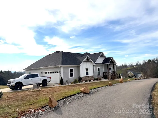 a view of a field with an trees