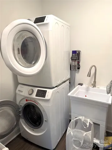 a view of a city with green field