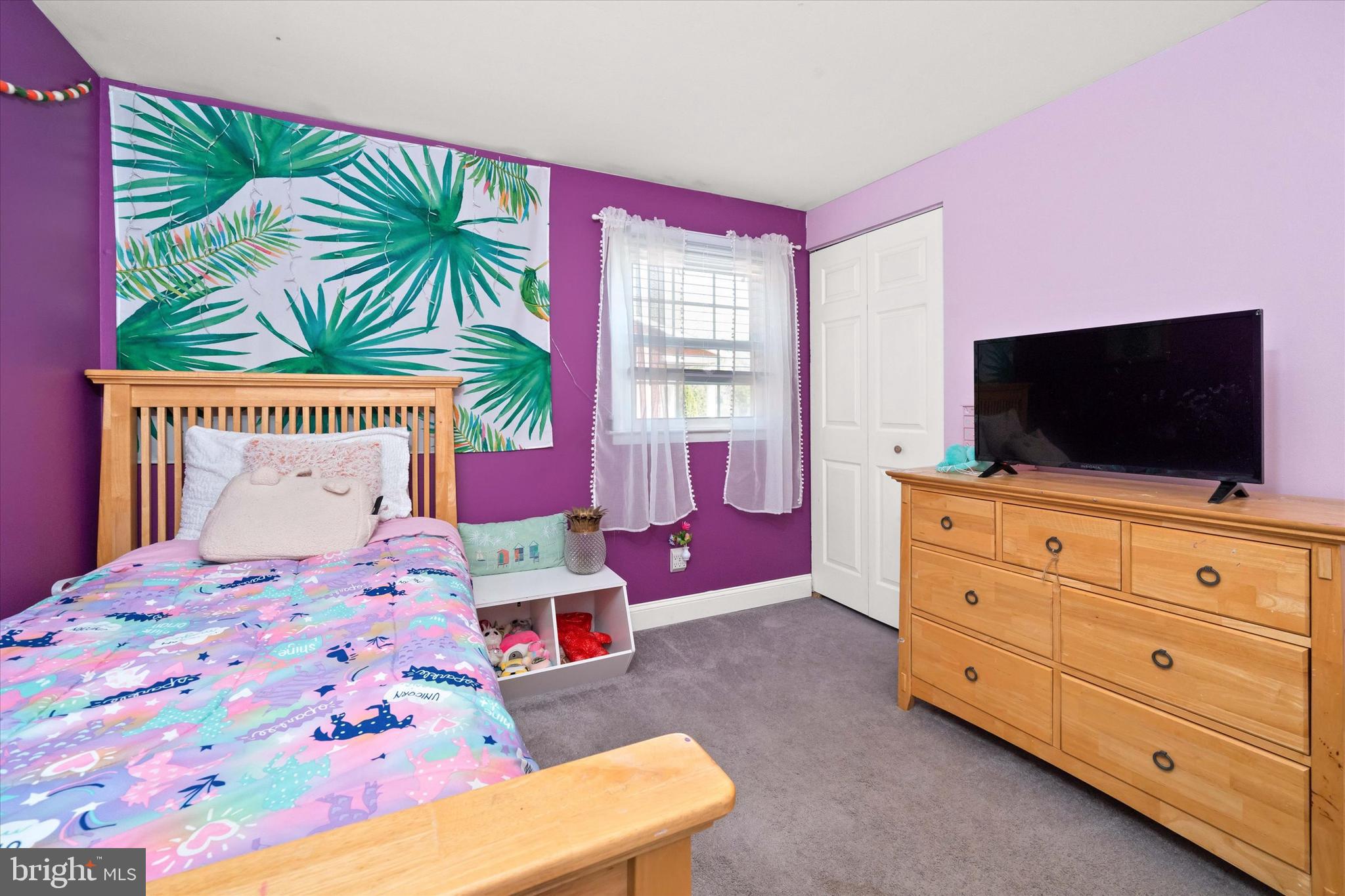 141 West Rutherford Drive Newark, DE 19713 - Photo 17 of 30 a bedroom with a bed and a flat screen tv