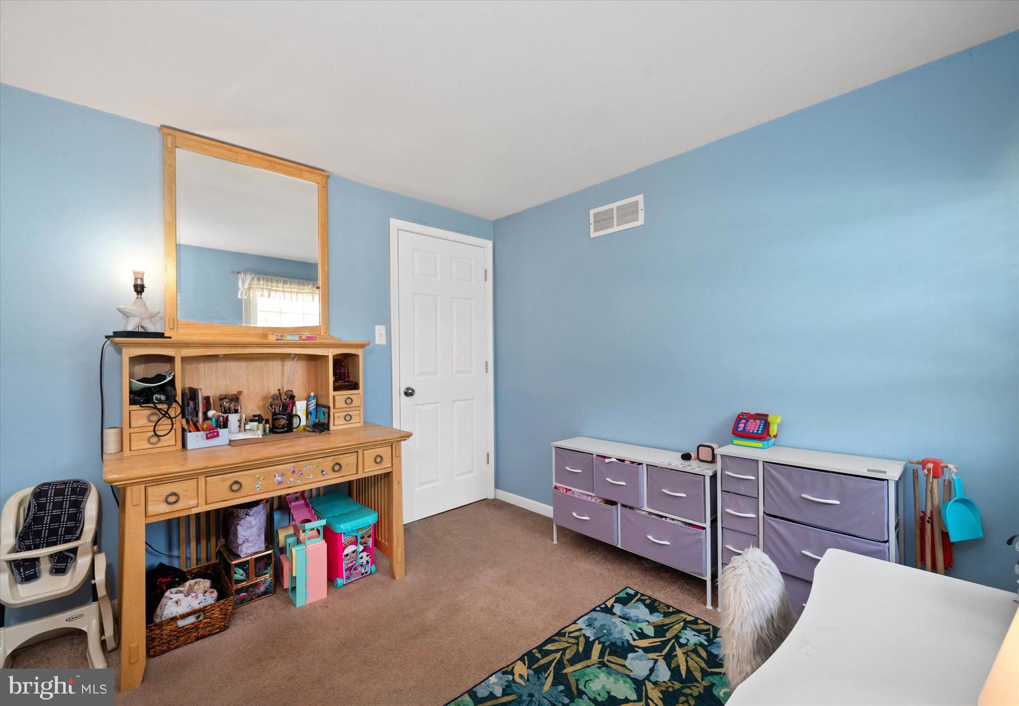 141 West Rutherford Drive Newark, DE 19713 - Photo 21 of 30 a bedroom with a bed and a baby crib