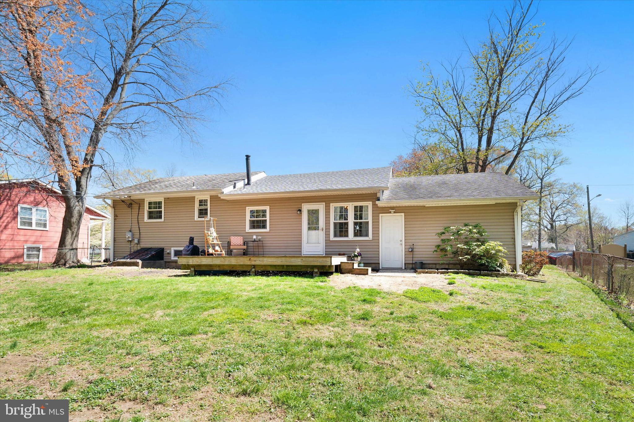 141 West Rutherford Drive Newark, DE 19713 - Photo 23 of 30 a front view of a house with a yard and trees