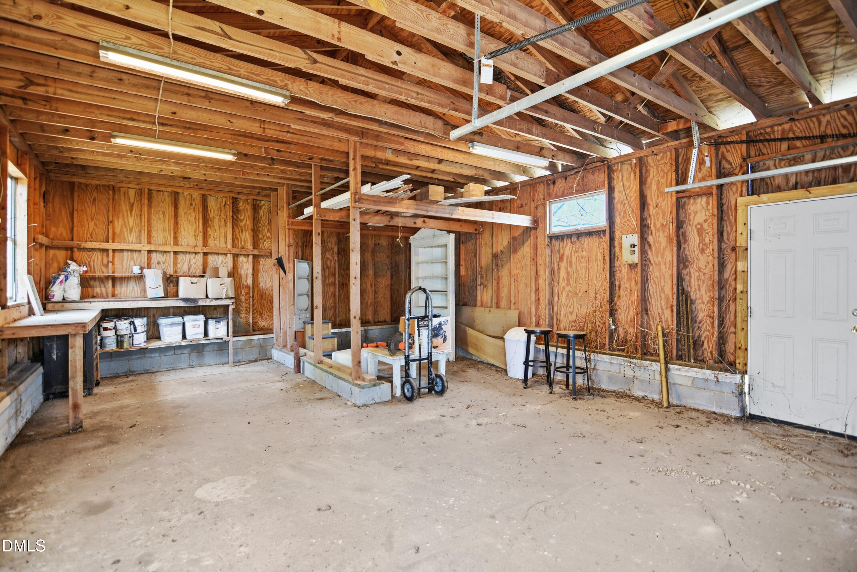 352 Eden Hills Road Siler City, NC 27344 - Photo 23 of 29 a view of a room with wooden walls