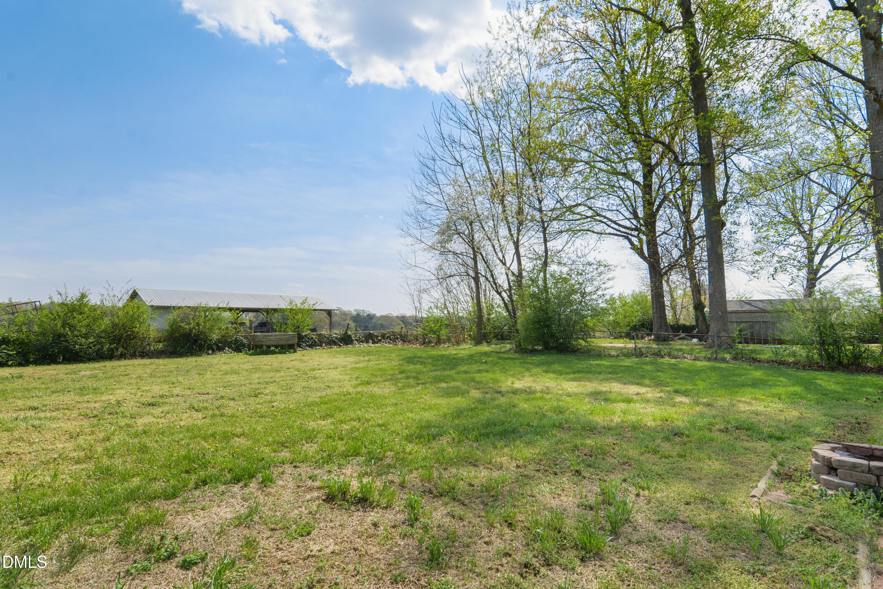 352 Eden Hills Road Siler City, NC 27344 - Photo 24 of 29 a view of a field with trees