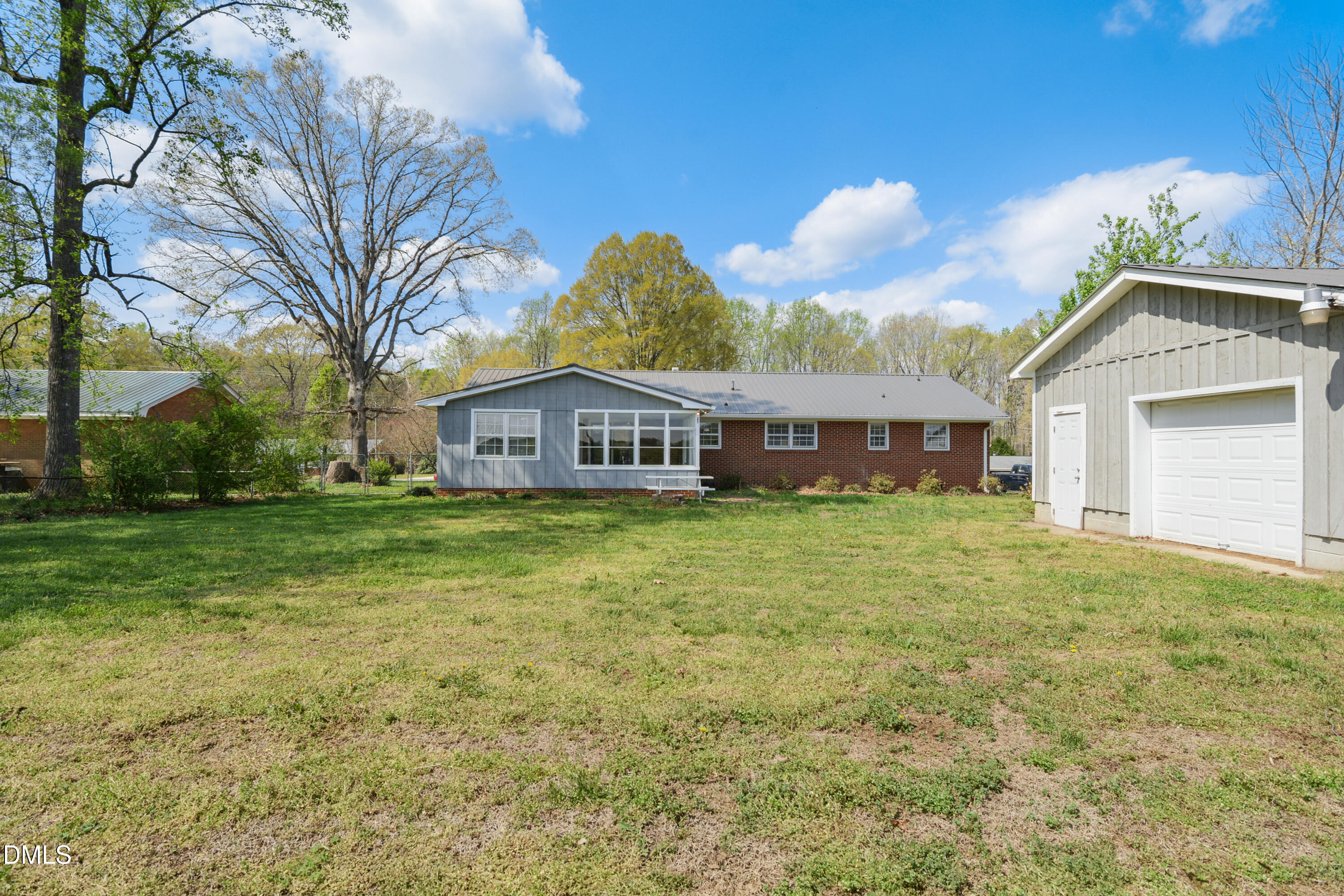352 Eden Hills Road Siler City, NC 27344 - Photo 26 of 29 a front view of house with yard and green space