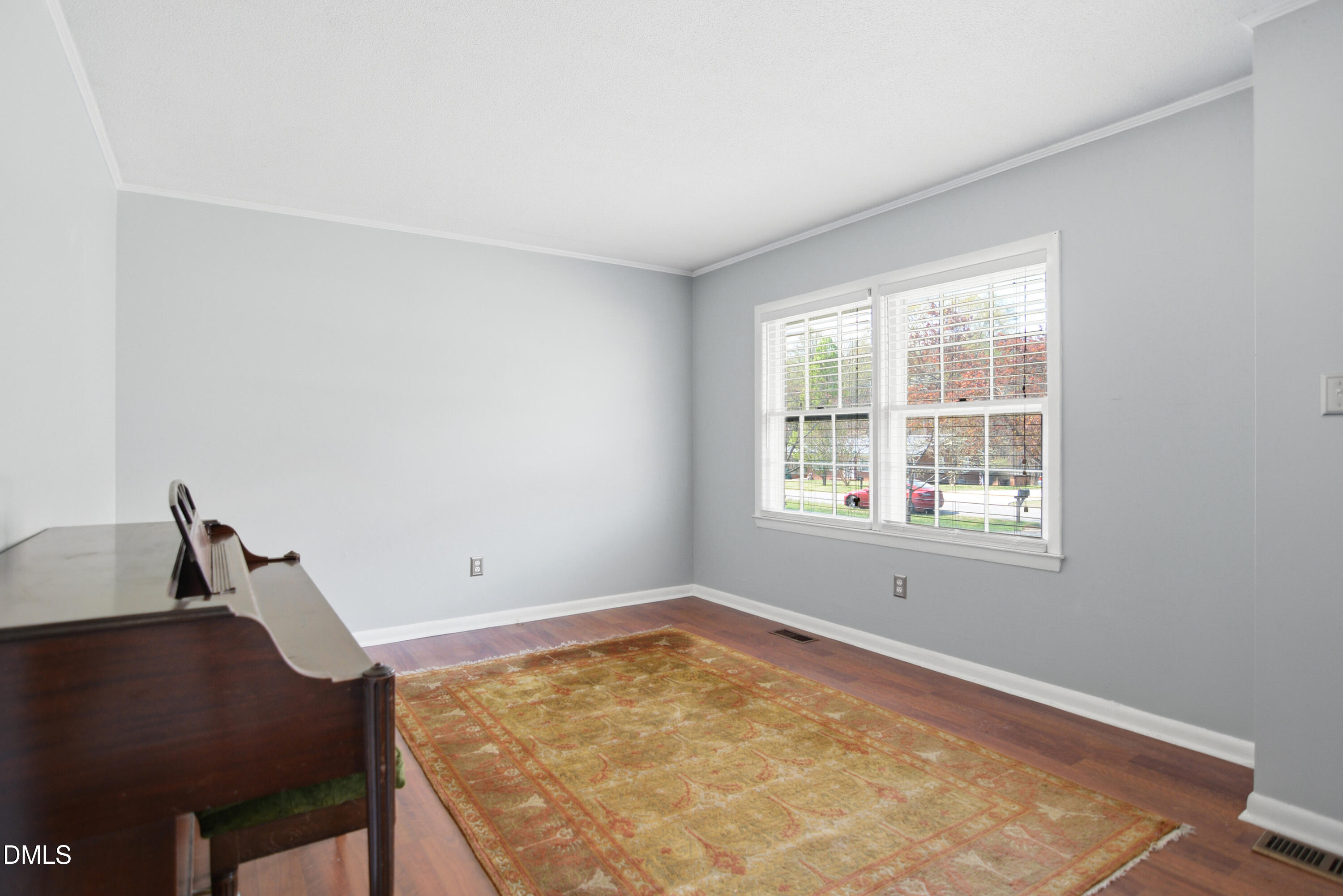 352 Eden Hills Road Siler City, NC 27344 - Photo 3 of 29 a view of a room with rack and window