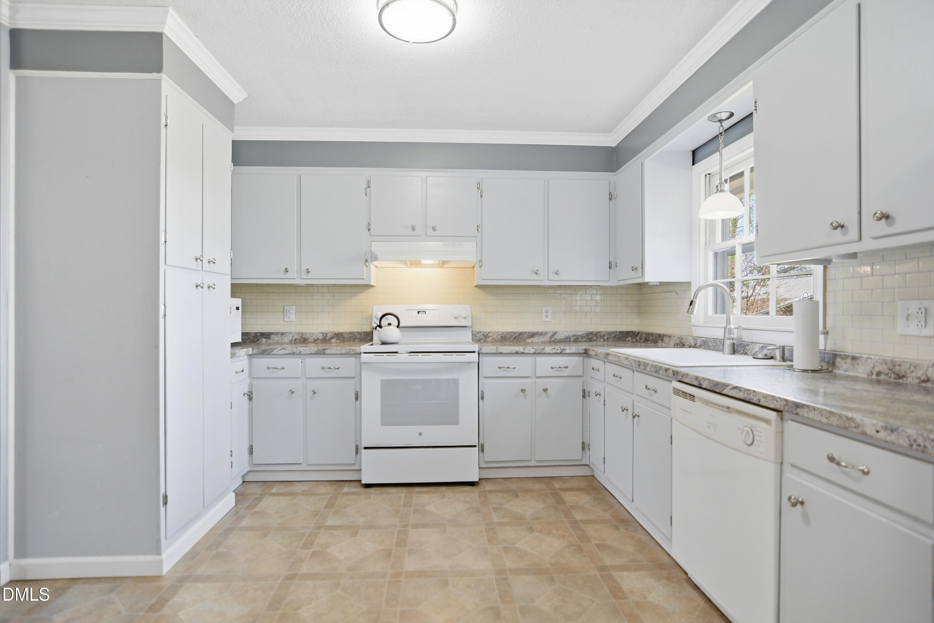 352 Eden Hills Road Siler City, NC 27344 - Photo 7 of 29 a kitchen with sink and cabinets