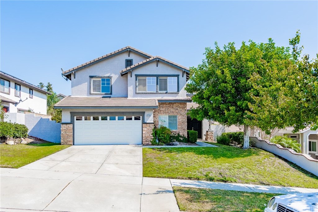6039 San Rafael Court Rancho Cucamonga, CA 91737 - Photo 1 of 1 a front view of a house with garden
