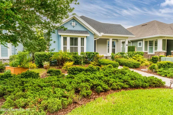 front view of a house with a yard