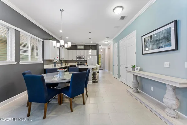 an aerial view of houses with outdoor space