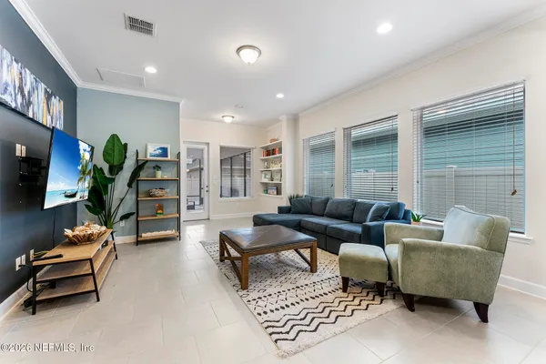 a view of a swimming pool with palm trees