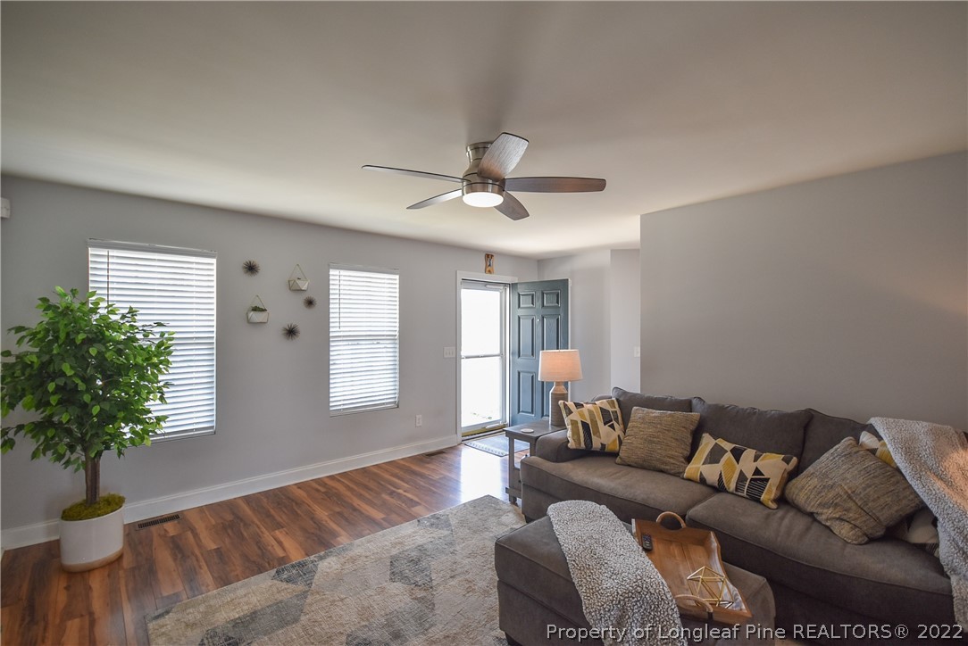 37 Jumpmaster Drive Broadway, NC 27505 - Photo 12 of 48 a living room with furniture and a large window