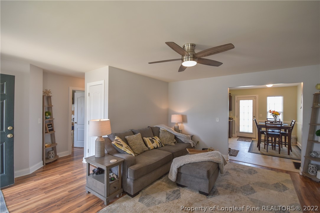 37 Jumpmaster Drive Broadway, NC 27505 - Photo 13 of 48 a living room with furniture and wooden floor