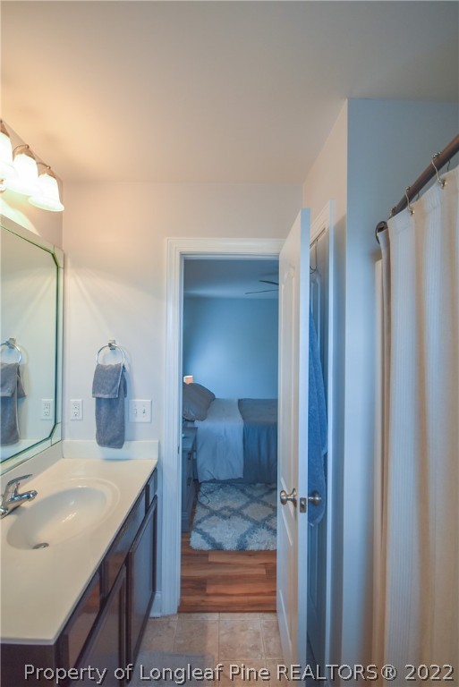 37 Jumpmaster Drive Broadway, NC 27505 - Photo 37 of 48 a bathroom with a sink and a mirror