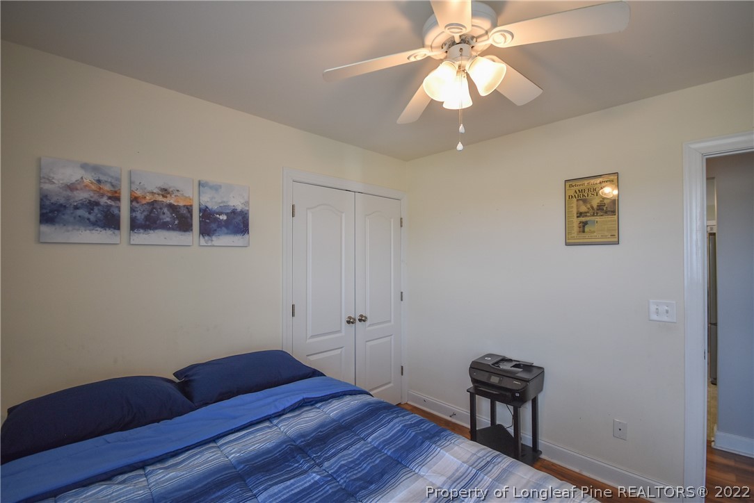 37 Jumpmaster Drive Broadway, NC 27505 - Photo 39 of 48 a view of room with hardwood floor and ceiling fan
