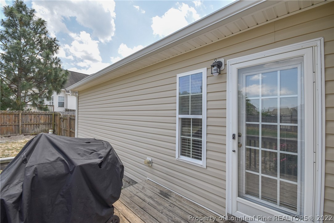 37 Jumpmaster Drive Broadway, NC 27505 - Photo 41 of 48 a view of a deck with wooden floor and fence