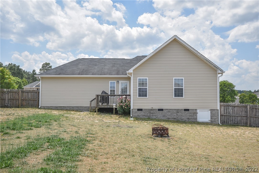 37 Jumpmaster Drive Broadway, NC 27505 - Photo 46 of 48 a view of a house with backyard and sitting area