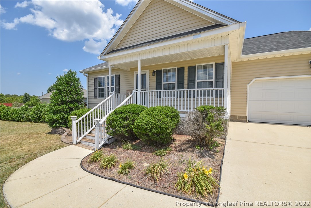 37 Jumpmaster Drive Broadway, NC 27505 - Photo 5 of 48 a front view of a house with garden