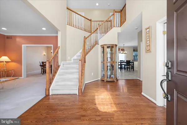a living room with furniture and white walls