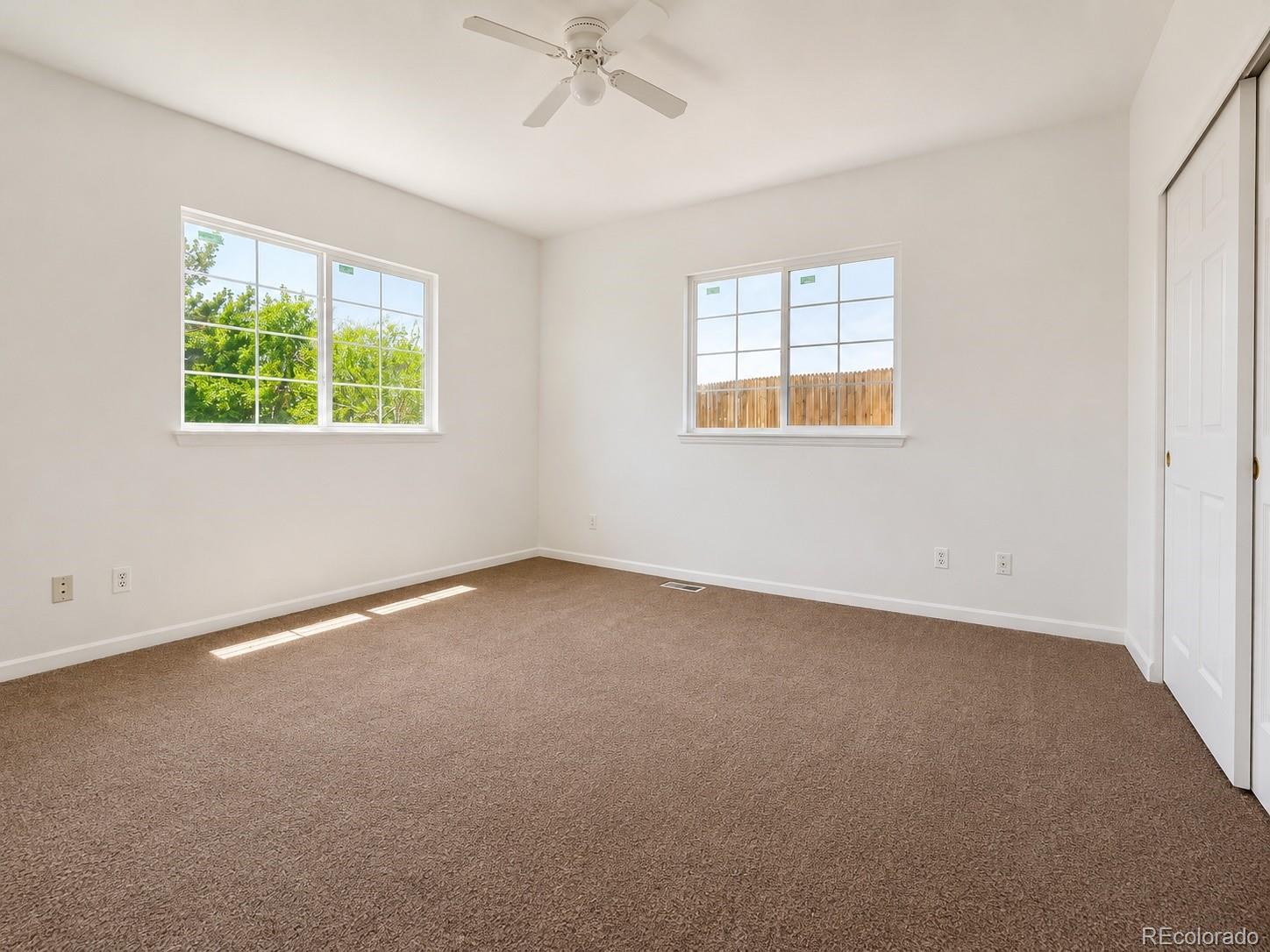 8199 Welby Road, Unit 4301 Denver, CO 80229 - Photo 12 of 19 an empty room with a window