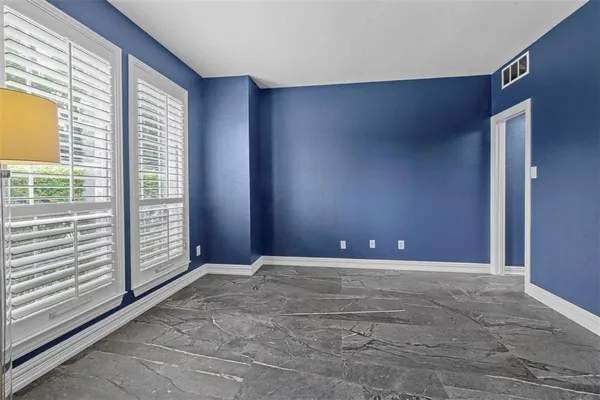 a view of an empty room with window