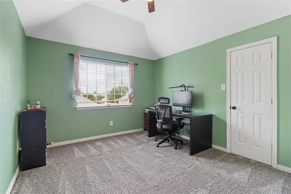 a room with furniture and a window