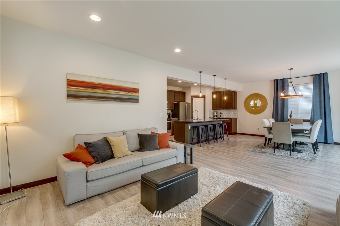 17627 3rd Avenue Southeast Bothell, WA 98012 - Photo 14 of 37 a living room with furniture and wooden floor