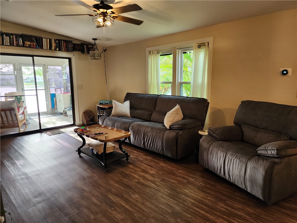 256 Bimini Cay Circle Vero Beach, FL 32966 - Photo 11 of 35 a living room with furniture and a large window