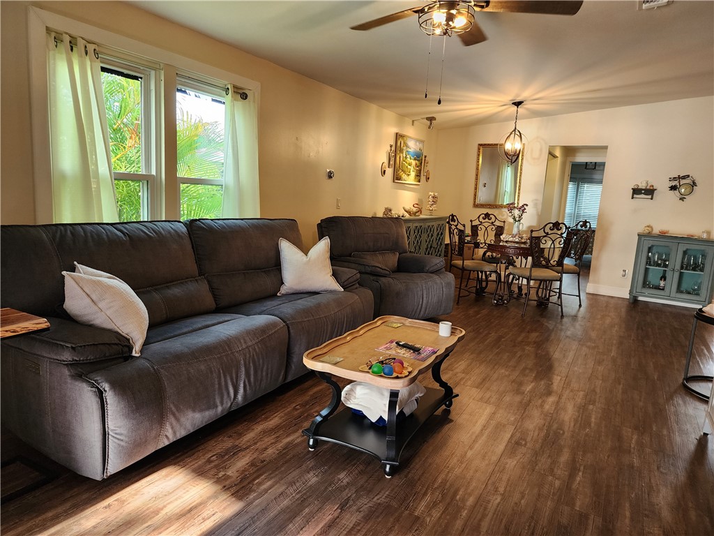 256 Bimini Cay Circle Vero Beach, FL 32966 - Photo 14 of 35 a living room with furniture and wooden floor