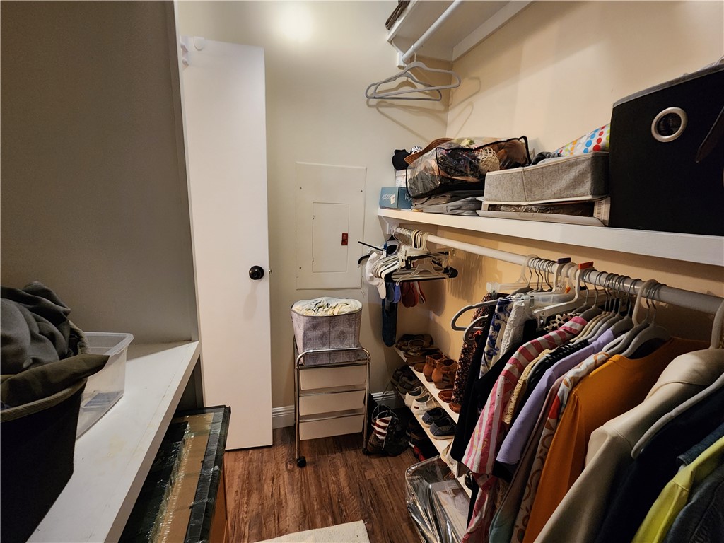 256 Bimini Cay Circle Vero Beach, FL 32966 - Photo 23 of 35 a view of walk in closet with clothes and shoes