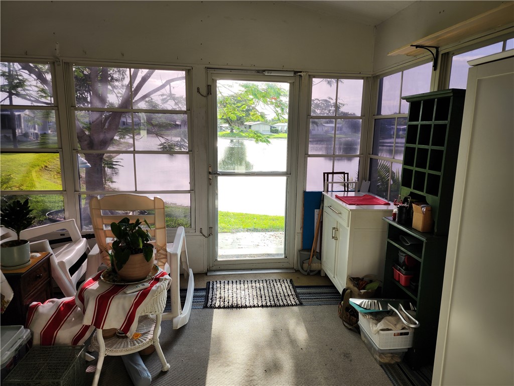 256 Bimini Cay Circle Vero Beach, FL 32966 - Photo 28 of 35 a room with gym equipment and a window