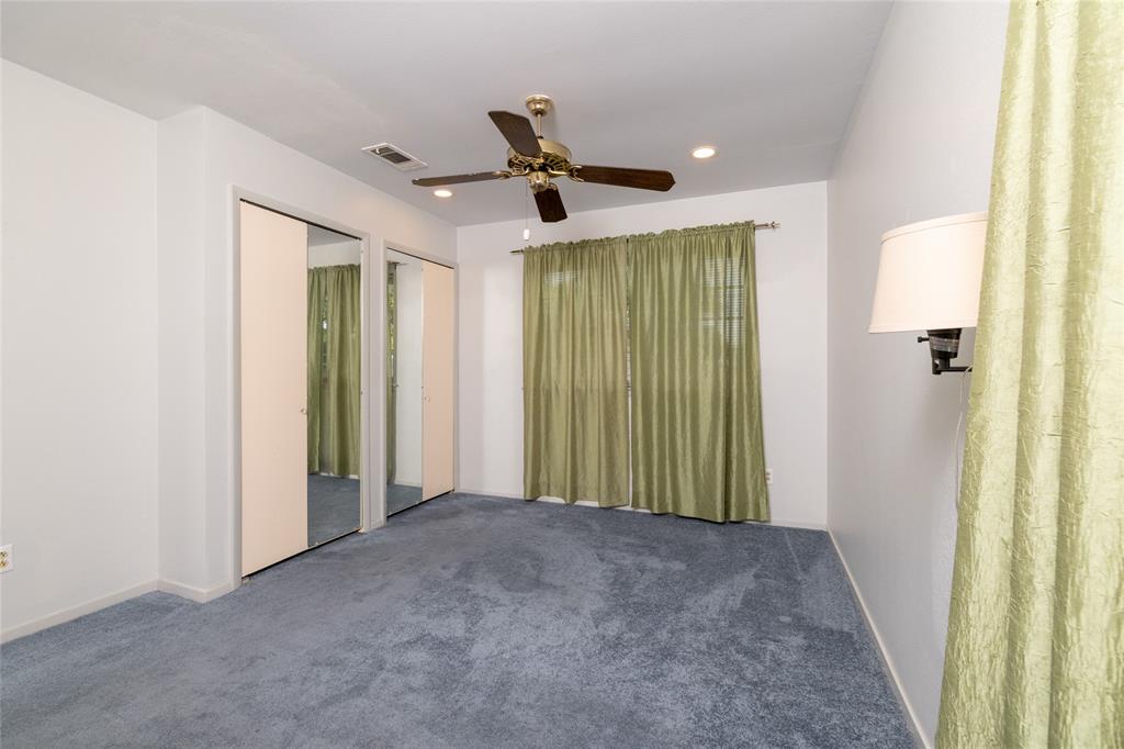 3605 Pleasant Run Road Irving, TX 75062 - Photo 28 of 32 Ceiling fan with light kit, recessed lighting, wall-mounted sconce, and mirrored closet doors