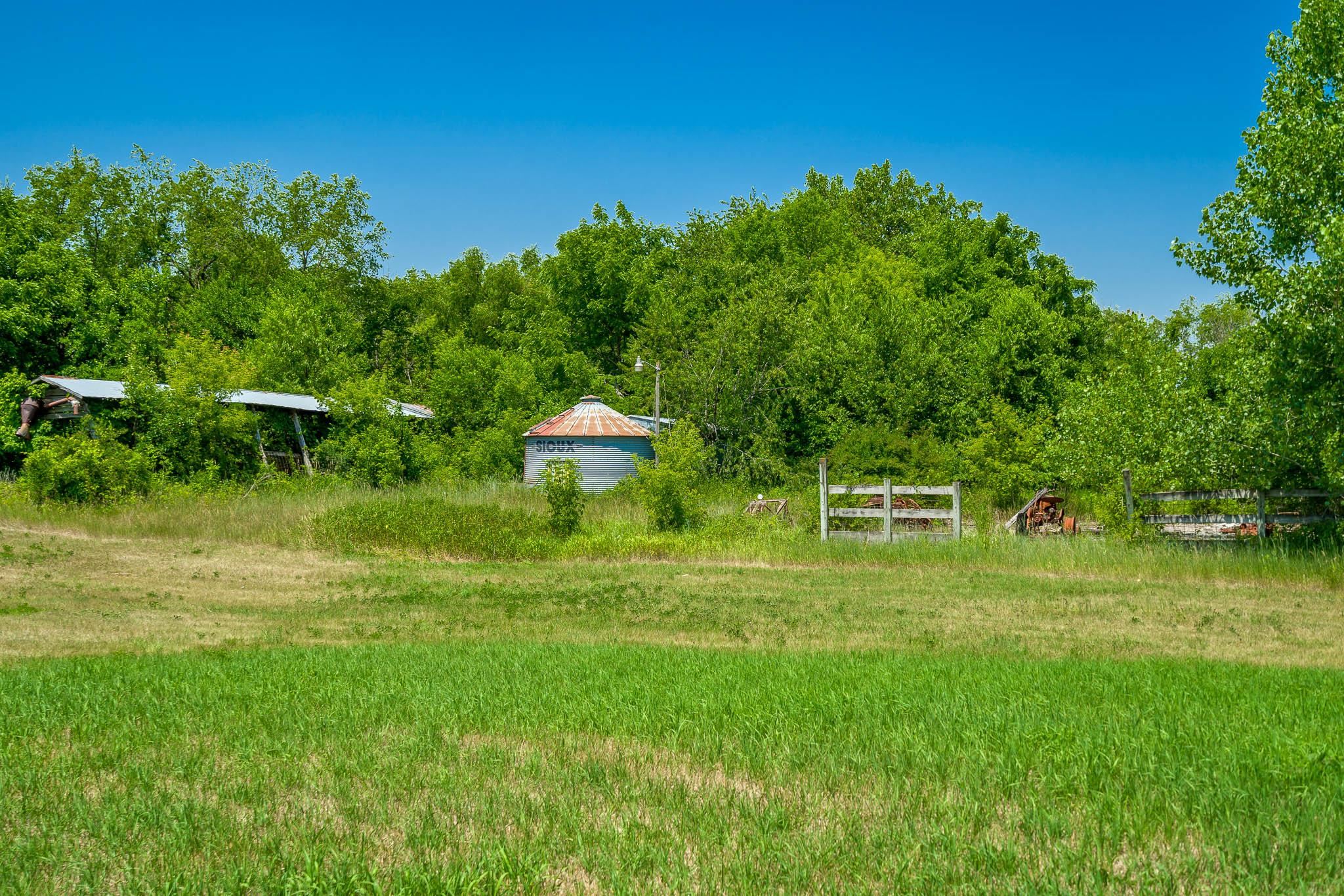 4470 North Cockrell Road Freeport, IL 61032 - Photo 56 of 99 a view of a park with a house in the background