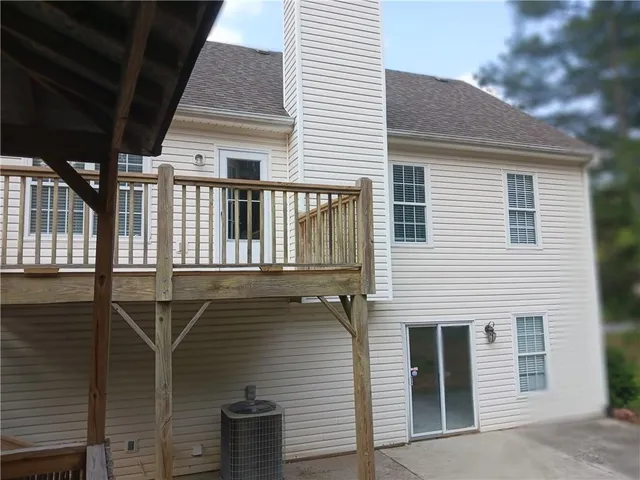 a view of deck with a flat screen tv