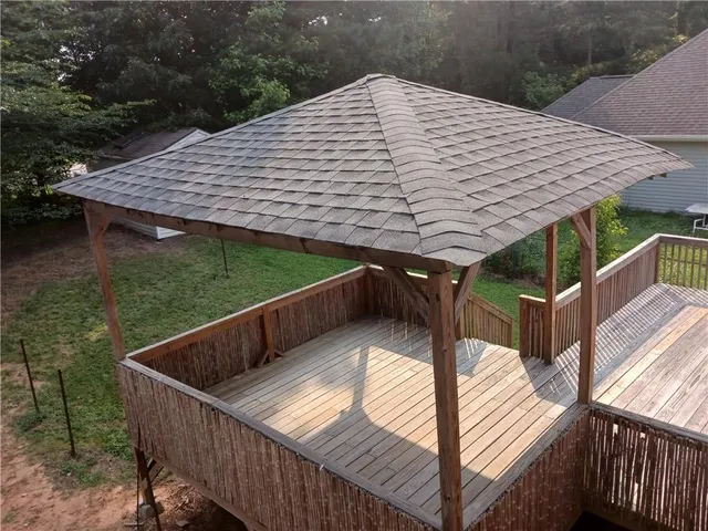 a house view with a backyard space