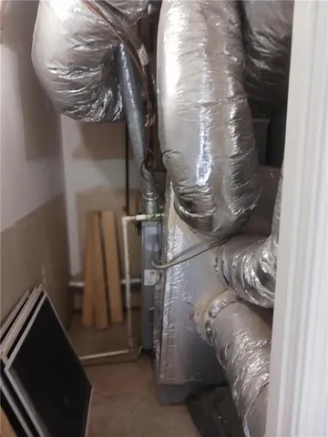 a view of a tree in front of a house