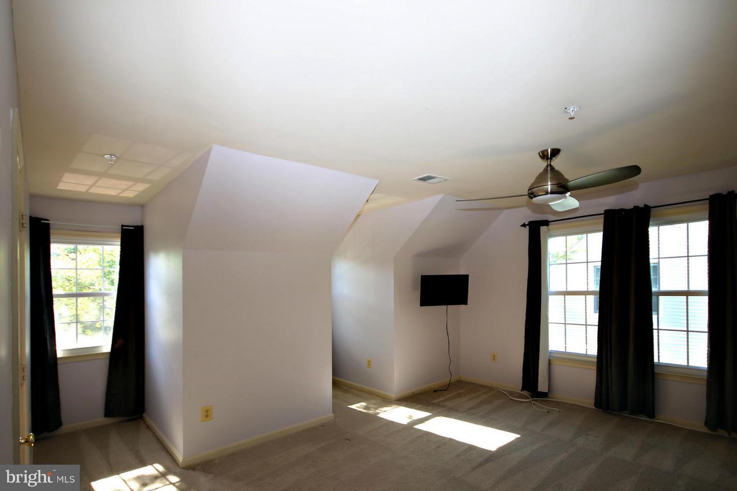 14416 Old Stage Road Bowie, MD 20720 - Photo 17 of 24 an empty room with windows
