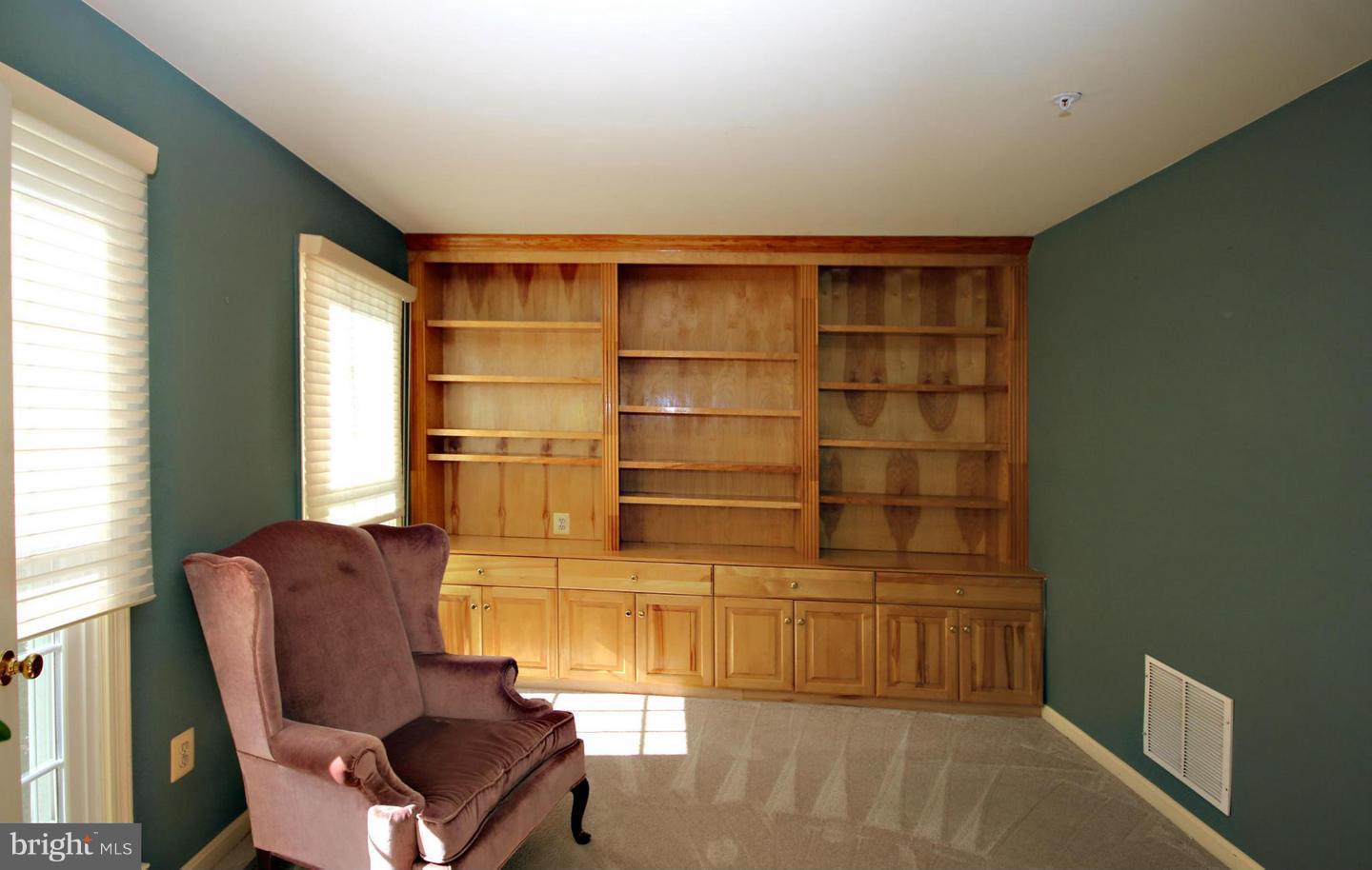 14416 Old Stage Road Bowie, MD 20720 - Photo 21 of 24 a room with furniture and a window