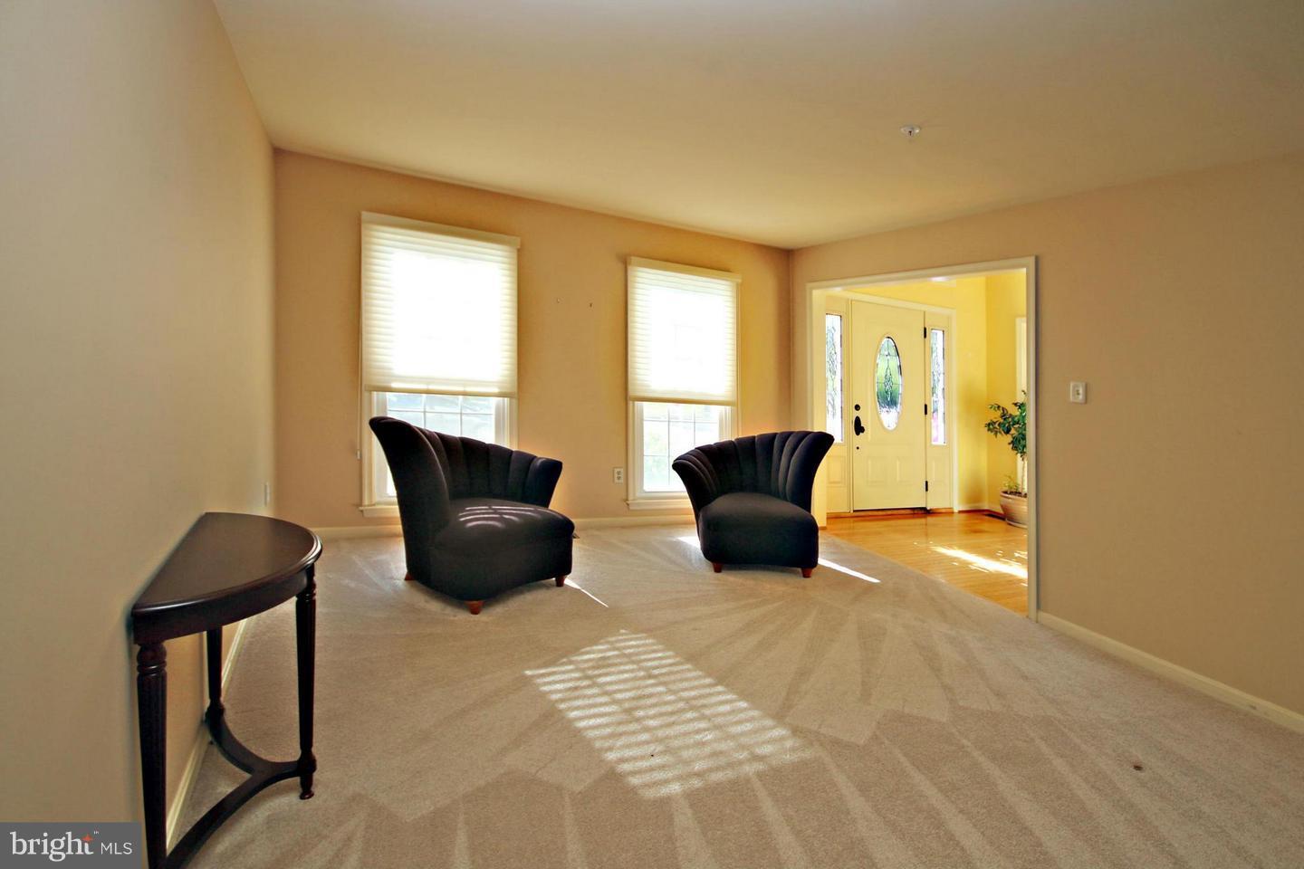 14416 Old Stage Road Bowie, MD 20720 - Photo 23 of 24 a living room with furniture and a potted plant