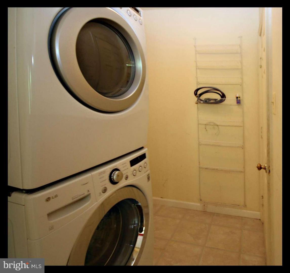 14416 Old Stage Road Bowie, MD 20720 - Photo 9 of 24 a utility room with dryer and washer