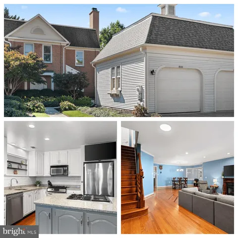 a view of a kitchen with kitchen island and living room