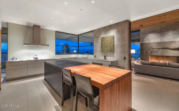 a kitchen with a sink appliances and a counter top space