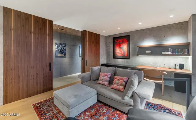 a bedroom with a bed and couch