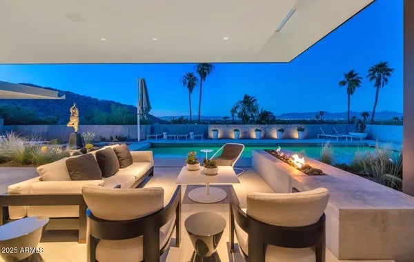 a view of a chairs and tables in patio