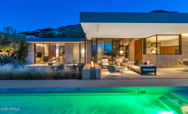 a view of a palm plant that is in front of a building