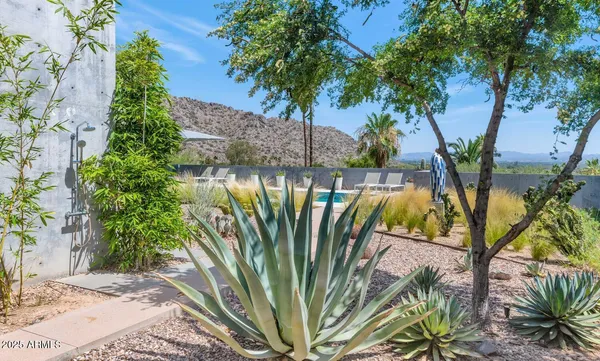 an aerial view of a house with a garden