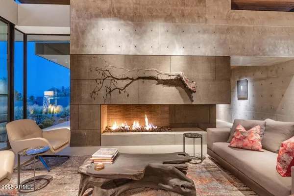 a living room with furniture and a table