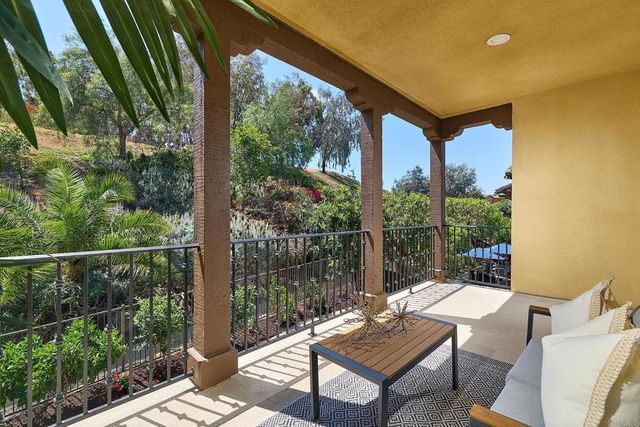 a outdoor living space with furniture and garden view