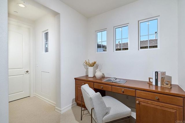 a bathroom with a sink a washer and dryer