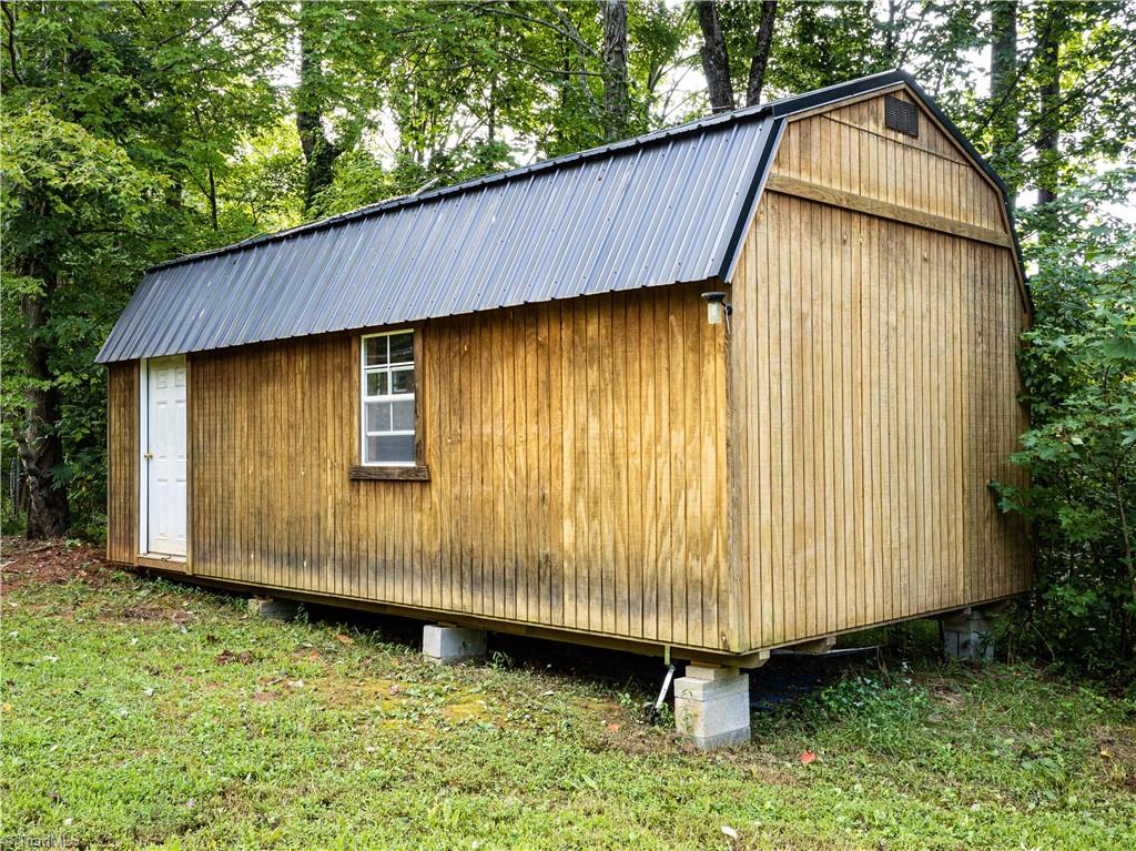 584 Danbury Bridge Road Madison, NC 27025 - Photo 25 of 26 Storage Building