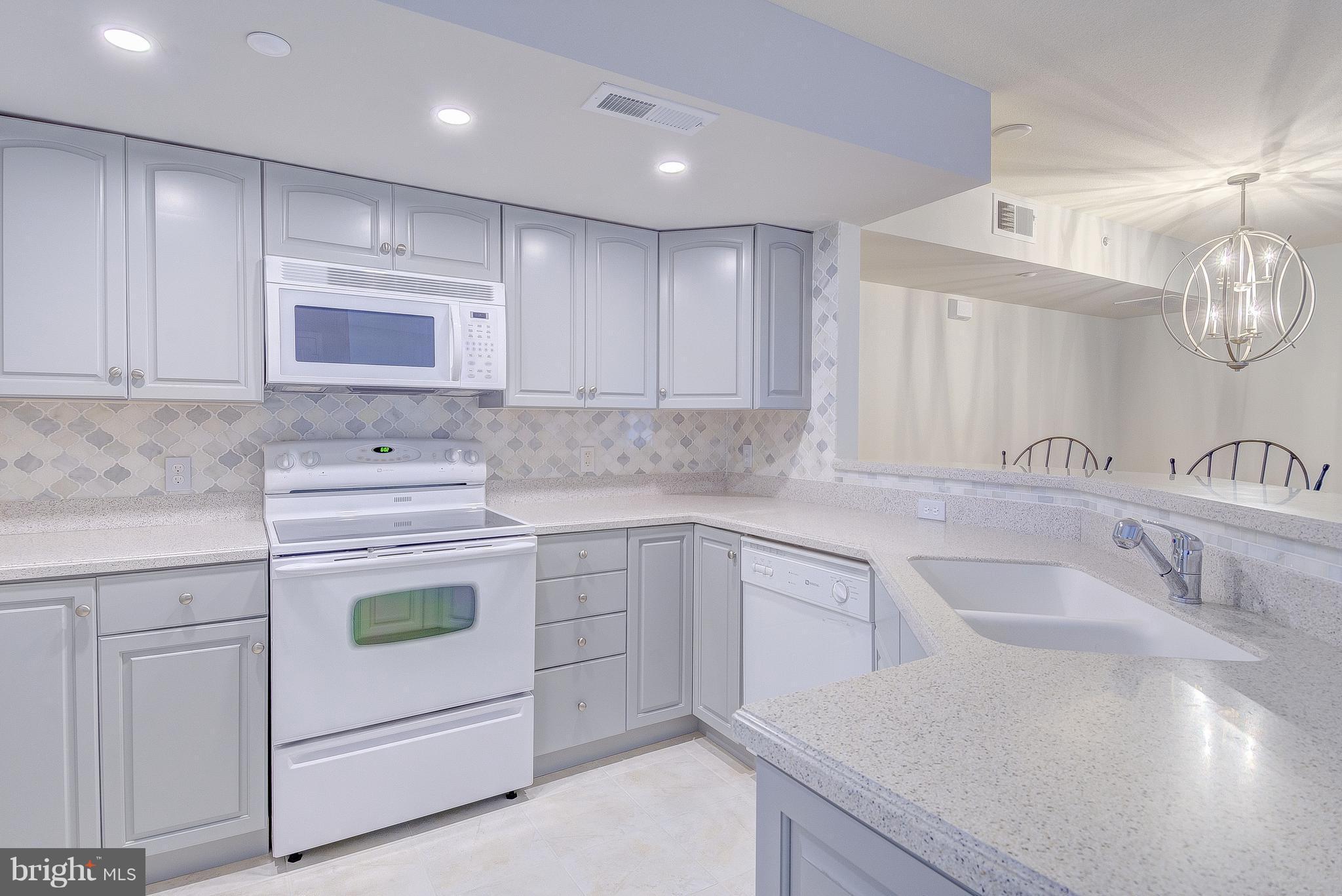 8501 Bayside Road, Unit PH2 Chesapeake Beach, MD 20732 - Photo 6 of 30 Gorgeous Kitchen With Corian Counters